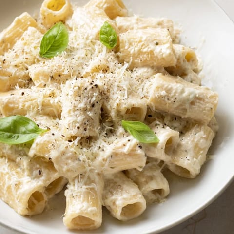 Silky, smooth creamy cottage cheese pasta with Parmesan and herbs, perfect for a quick dinner.