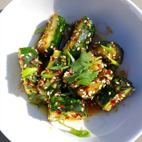 This delicious Chinese Spicy Smashed Cucumber Salad is ready to eat, bursting with fresh, zesty flavors.