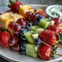 Rainbow Fruit Skewers with Honey Dip: colorful, juicy fruits arranged in rainbow order with a creamy honey-yogurt dip for dipping.